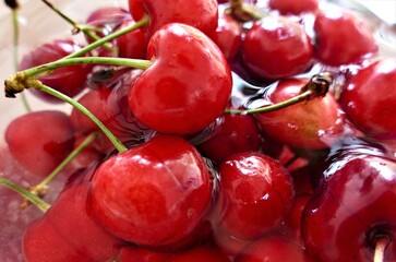 Fresh cherries in the water fruit background