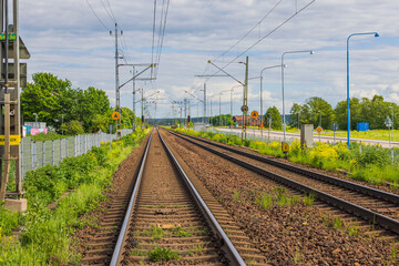 Fototapeta na wymiar Beautiful view of railroad track in city on summer day. Sweden.