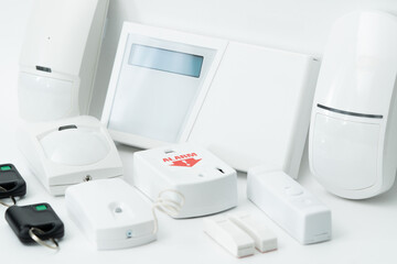 Close-up of home security equipment, on white background.