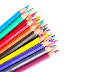 colored pencils lined on a white background