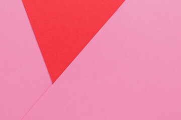 Two color texture with empty space. Pink and red paper background
