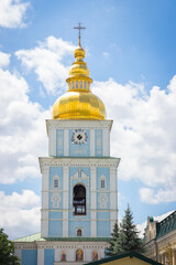 Fototapeta na wymiar St.Michael Church in Kyiv. Famous ancient Ukrainian cathedral. Old religious architecture. Ukrainian culture. Kyiv landmark. Golden bell tower of orthodox church.