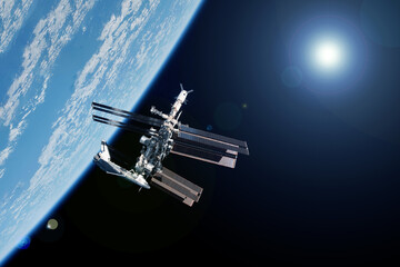 Iss over the planet Earth. Elements of this image furnished by NASA
