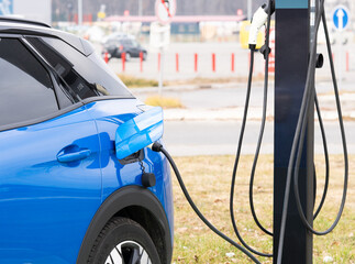 EV charging station for electric vehicle in green energy and eco energy concept.