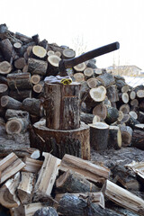 Stacked firewood, prepared for home heating, winter preparation, firewood storage, firewood log stack