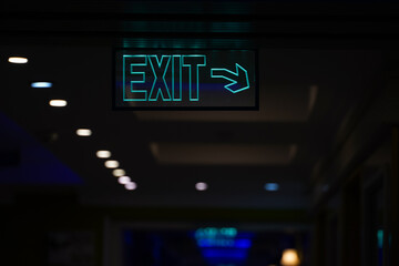 exit. sign showing the way out of a hotel. illuminated sign. photo inside.