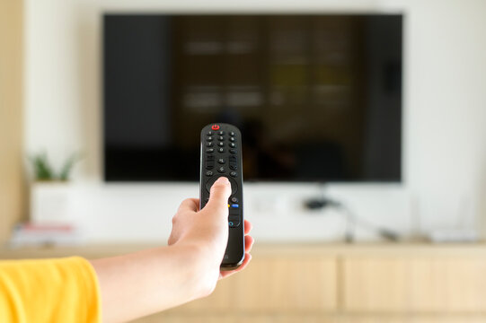 Close Up Of Hand Holding  Tv Remote Controller