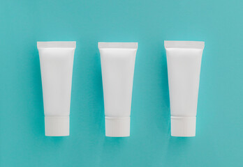 Dental floss case on blue background. Daily dental care. Advertising concept