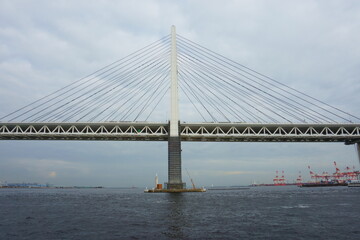 Fototapeta na wymiar Yokohama bay bridge is an 860 metres crosses Tokyo Bay
