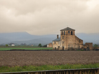 Old abandoned monastery in a field in the countryside of Andalusia, Spain.