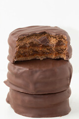 A pile of alfajor stuffed with dulce de leche.