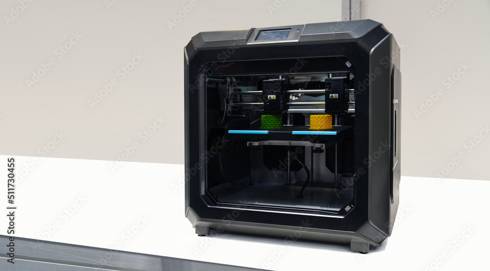 Poster a 3d printer in the laboratory prints a structure from a polymer