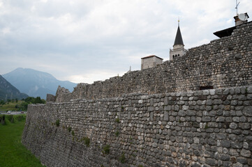 Italy, June 2022: view of the village of Venzone, destroyed and rebuilt after the 1976 earthquake,...