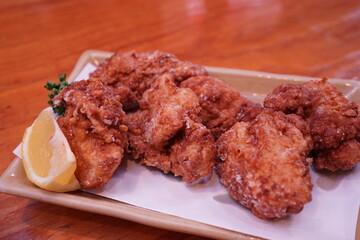 Traditional Japanese Fried Chicken Karaage on Plate - 唐揚げ レモン