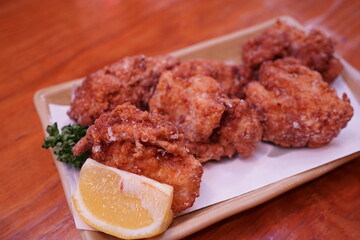 Traditional Japanese Fried Chicken Karaage on Plate - 唐揚げ レモン