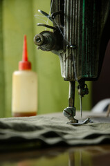 sewing machine and oil bottle nearby