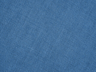 Blue woven surface closeup. Linen textile texture. Graceful color fabric background. Textured braided backdrop. Macro