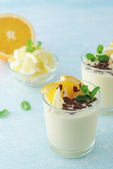 Orange lemon citrus milk mousse in glasses