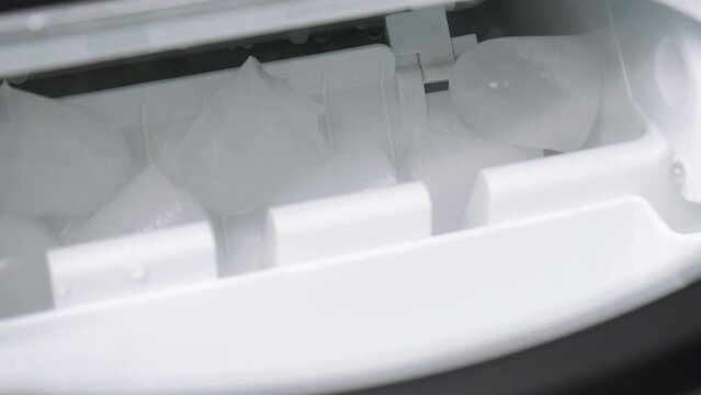 ice cubes prepared in an ice machine. close-up shooting. High quality 4k footage