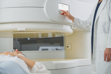 Close up of patient is ready to do magnetic resonance imaging MRI or CT scan in clinic
