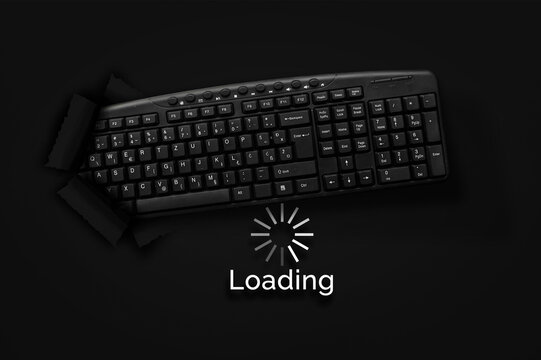 PC keyboard with loading bar  om black background.