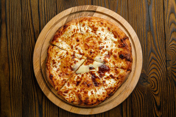 Georgian cuisine. Khachapuri on a wooden table
