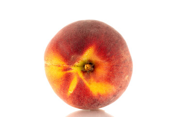 One sweet organic peach, closeup, isolated on white background.