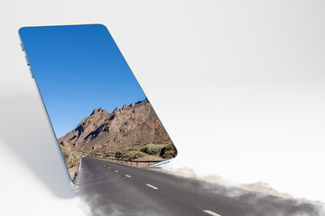 Mobile phone and image of a road in the mountains. The concept of opening borders and tourism through mobile applications.
