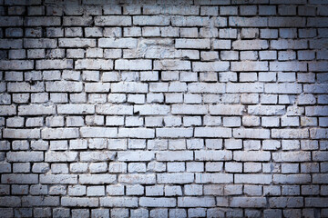 Obraz premium White brick wall with vignetted corners., old brick, grunge texture background.