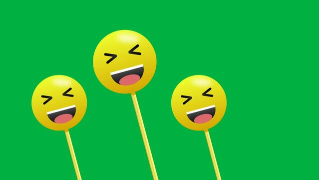 Laughing emoji in swinging motion animation. 