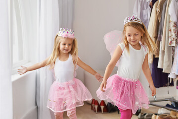 Having fun in imagination land. Cropped shot of little girls wearing fairy princess costumes. © Marius V/peopleimages.com