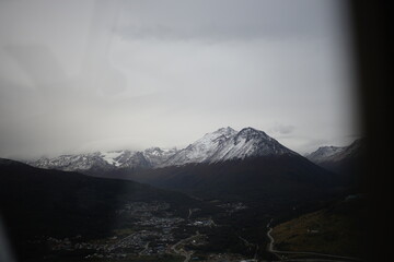 the photo captures the moment of takeoff and flight by plane over Ushuaia &mdash; a city and port in southern Argentina.