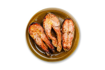 cooked fish on a plate on a white background
