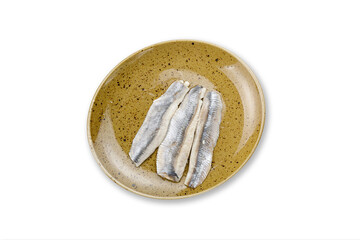 cooked fish on a plate on a white background
