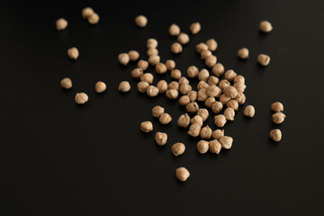 Organic sprouted chickpeas. heap of dried chickpeas on black background