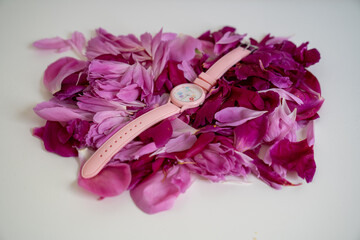 pink silicon watch on rose petals 