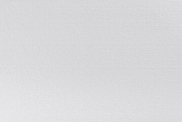 Grainy texture of white foam surface, background.