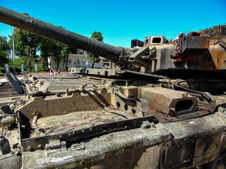 Tank, broken Russian military equipment, on the square in Kyiv, Ukraine