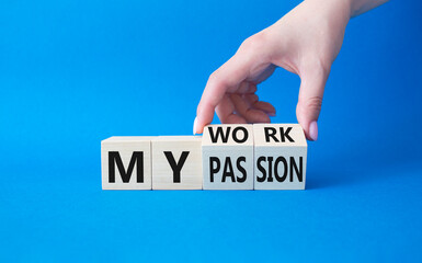 My work My passion symbol. Wooden cubes with words My work My passion. Beautiful blue background....