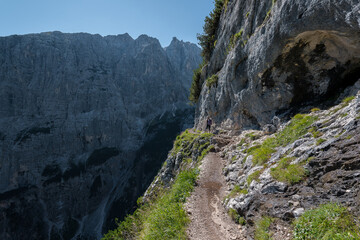Trail path on the way to lake Sorapiss in the Italian Dolomites mountains. Trekking in the Alps. 