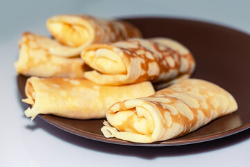 Homemade pancakes in a plate . Tasty breakfast 