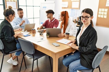 Group of business workers smiling happy working at the office