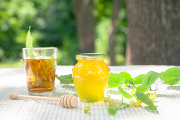Natural linden honey with linden flowers
