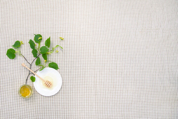 Natural linden honey with linden flowers