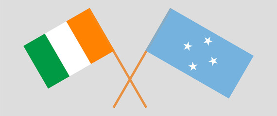 Crossed flags of Ivory Coast and Micronesia. Official colors. Correct proportion