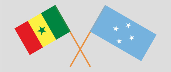 Crossed flags of Senegal and Micronesia. Official colors. Correct proportion