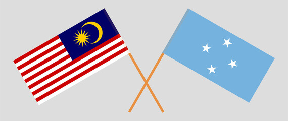 Crossed flags of Malaysia and Micronesia. Official colors. Correct proportion
