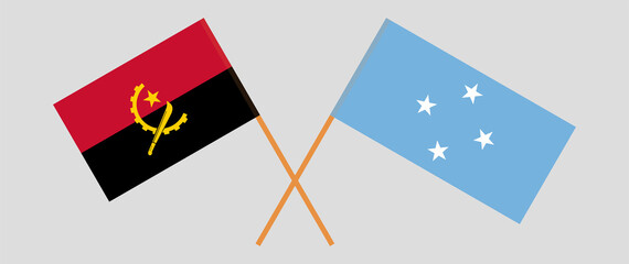 Crossed flags of Angola and Micronesia. Official colors. Correct proportion