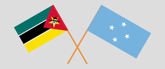 Crossed flags of Mozambique and Micronesia. Official colors. Correct proportion