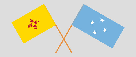 Crossed flags of the State of New Mexico and Micronesia. Official colors. Correct proportion